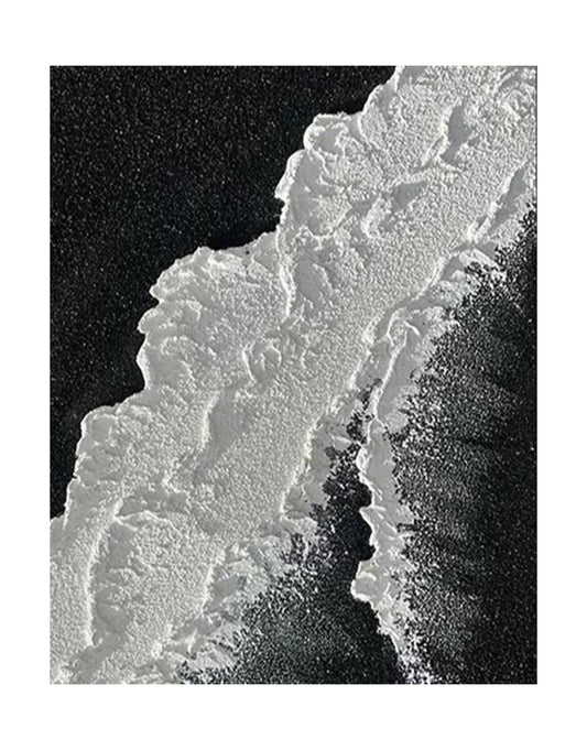 "BLACK BEACH, STYLE A: Hand-painted Portrait shaped and Landscape shaped textured wall art painting depicting a black beach with crashing waves, in shades of black, white, and grey."