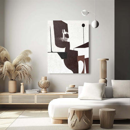 "Hand-painted abstract textured wall art named 'Echoes of Solitude.' The artwork features a white background with abstract brown and black shapes, including an abstract face. The face appears contemplative, as if gazing into the distance. Hanging in the lounge."