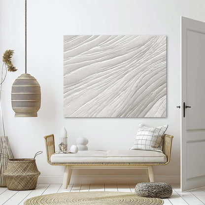 "Hand-painted abstract textured wall art titled 'GLACIER.' This versatile artwork, suitable for both portrait and landscape orientations, showcases a composition full of dimension and linear elements, with a dominant colour palette of white, hanging in the lounge."