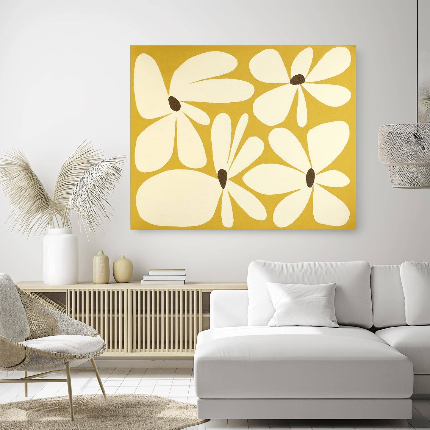 "Hand-painted, abstract textured wall art depicting blooming flowers. Titled 'GOLDEN BLOSSOM,' this artwork in Landscape orientation features vibrant shades of yellow and cream, elegantly displayed on the living room wall."