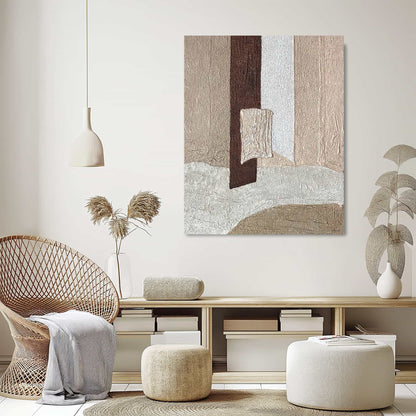 "Hand-painted abstract textured wall art named 'GLUE.' This artwork, suitable for both portrait and landscape orientations, is characterized by a rich sense of texture. The color palette features tones of tan, brown, and white, creating a visually engaging composition, hanging in the lounge."