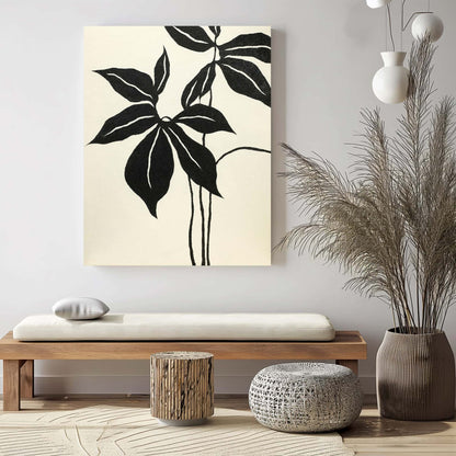 "Hand-painted, frameless abstract textured wall art depicting abstract leaves. Titled 'LEAVES DANCE, STYLE B,' this artwork is designed for portrait hanging, featuring a colour palette of black and cream, hanging in the hallway."