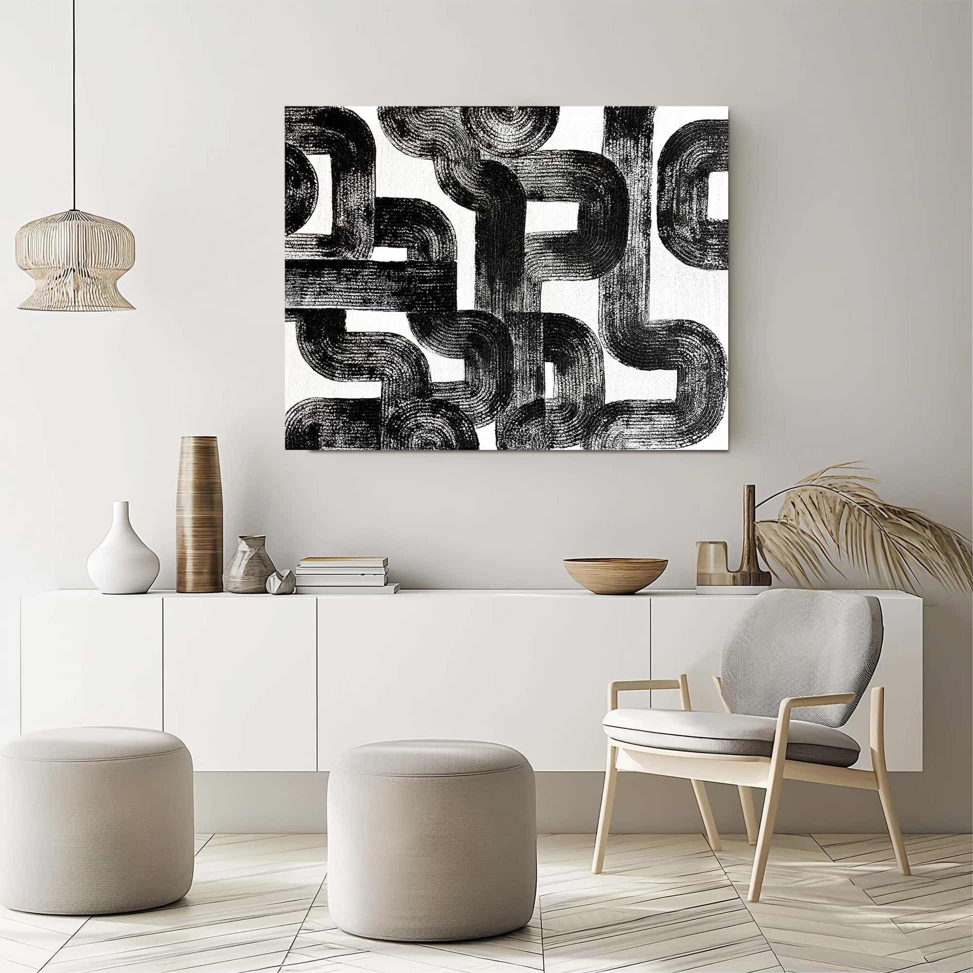 "Hand-painted Landscape shaped abstract textured wall art named 'Maze Melody.' The artwork features a white background with black, pipe-like textures that appear chaotic yet structured, intertwining like a maze. Hanging in lounge."