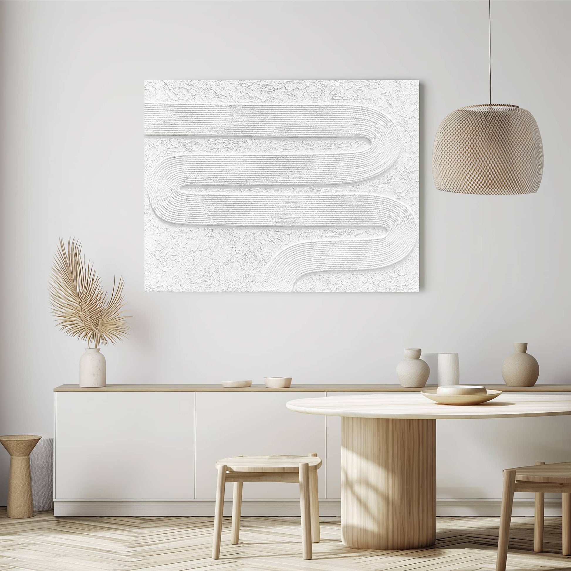 "Hand-painted Landscape shaped abstract textured wall art named 'Serenity Threads,' featuring white threads arranged in regular curves, hanging in the dining room."