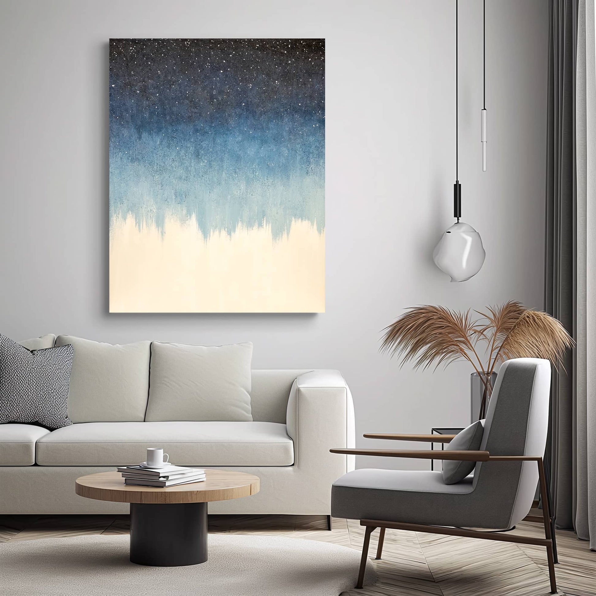 "Hand-painted, frameless abstract textured wall art depicting a starry night sky. Titled 'STARFIELD,' this portrait-shaped artwork features a colour palette of navy blue and white, hanging in the living room."