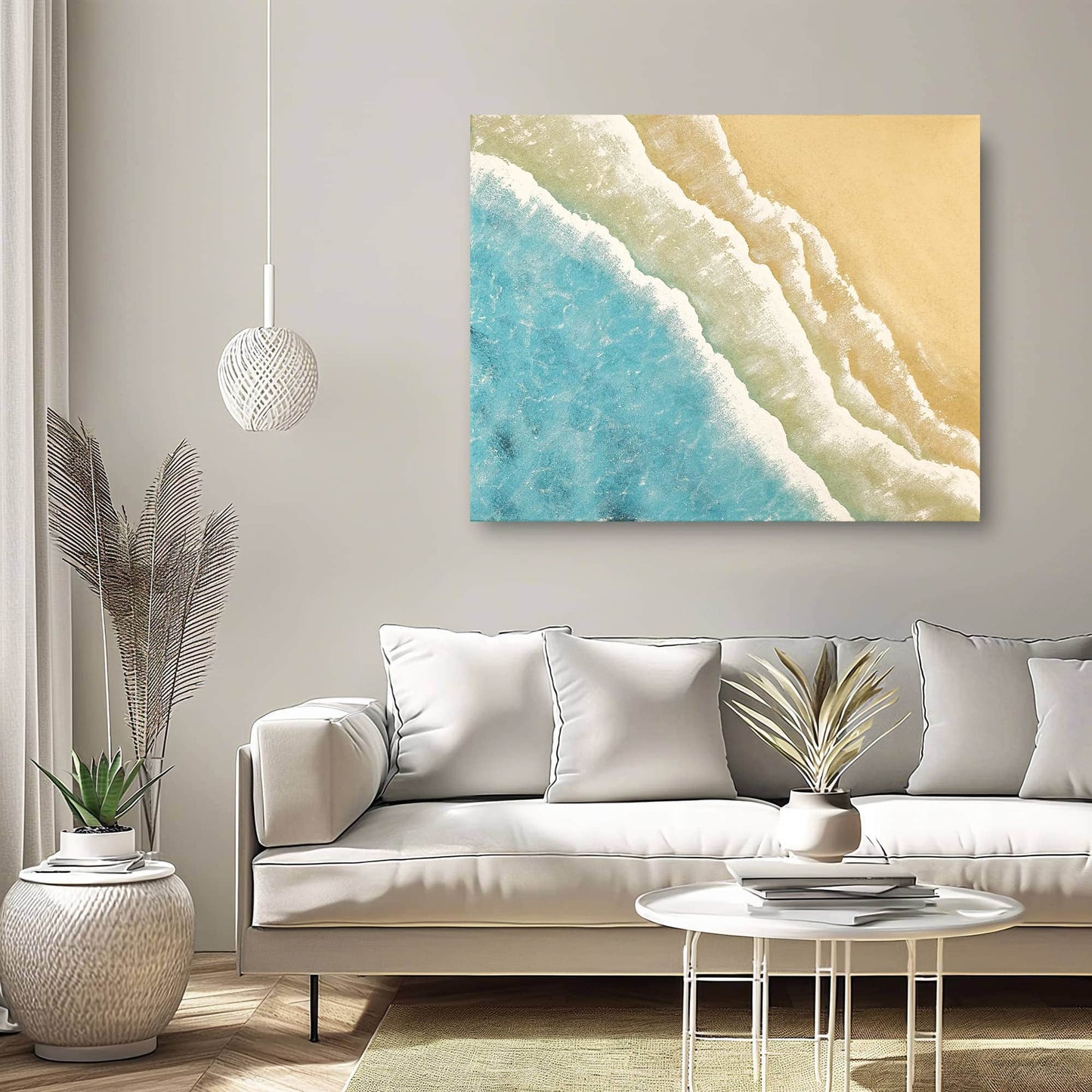 "Hand-painted, textured wall art depicting waves and sandy shores. Titled 'THE SEASHORE, STYLE B,' this landscape-shaped artwork in shades of blue, cream, and white is elegantly hung in the living room."