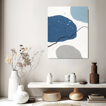 "CELLULAR BALLET, STYLE A: Hand-painted Portrait shape abstract texture wall art painting in black, white, blue, grey, and silver colours, hanging in the hallway."