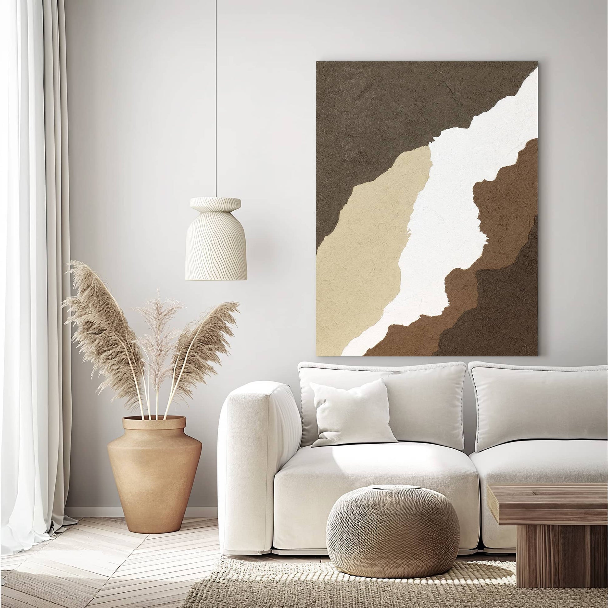 "CANYON, STYLE A: Hand-painted Portrait shaped abstract textured wall art painting in white, cream, tan, and brown colours, hanging in the living room."