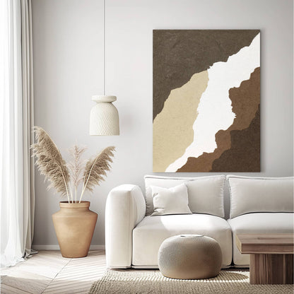 "CANYON, STYLE A: Hand-painted Portrait shaped abstract textured wall art painting in white, cream, tan, and brown colours, hanging in the living room."