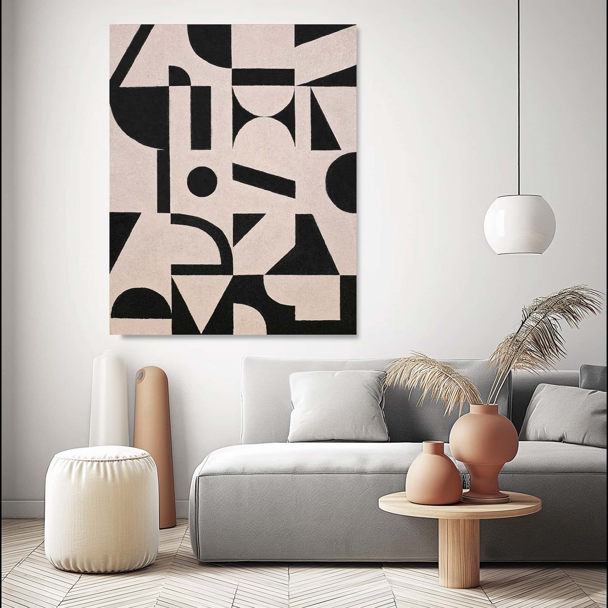 "GEOMETRIC COLLAGE, STYLE A: Hand-painted Portrait shaped abstract textured wall art painting with a geometric feel, in shades of cream, white, black, and tan, hanging on the wall in the living room."