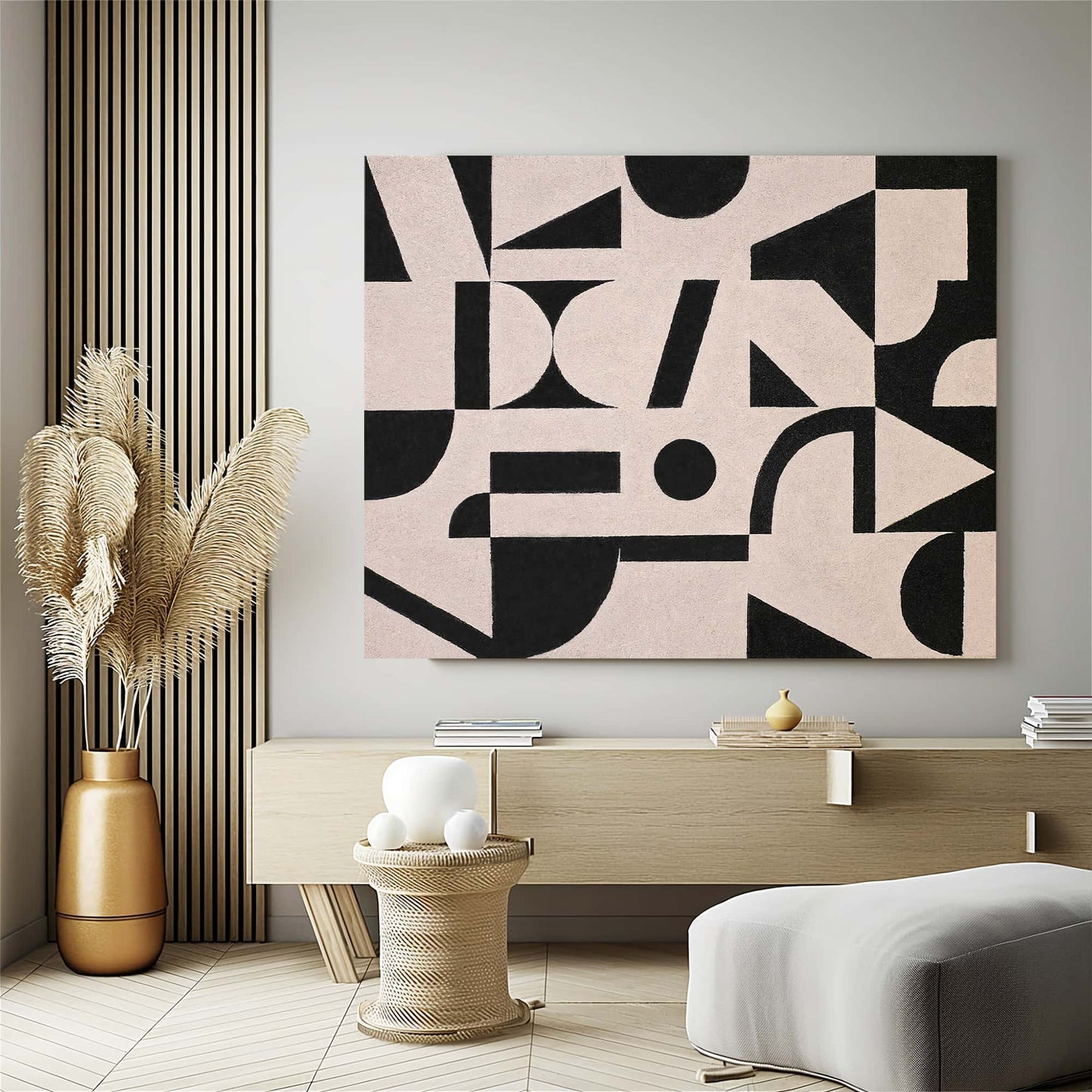 "GEOMETRIC COLLAGE, STYLE A: Hand-painted Landscape shaped abstract textured wall art painting with a geometric feel, in shades of cream, white, black, and tan, hanging on the wall in the lounge."