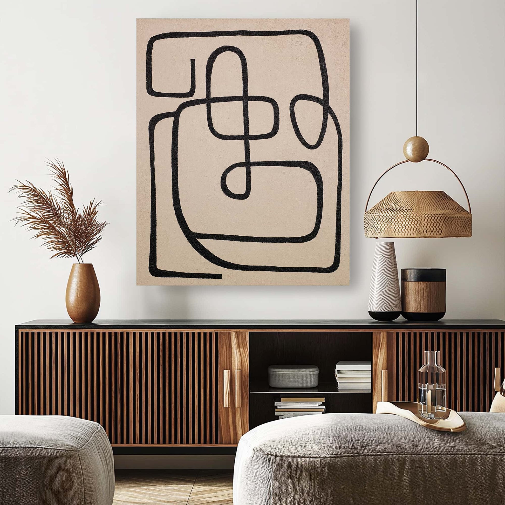 "PATH: Hand-painted Portrait shaped and Landscape shaped abstract texture wall art painting depicting an abstract single-stroke representation of a path, in shades of black and tan, hanging on the wall in the lounge."