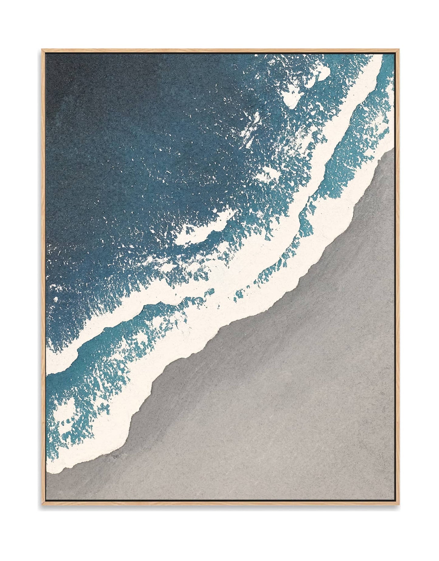 "SEASIDE, STYLE A: Hand-painted Portrait shaped and Landscape shaped textured wall art painting depicting a grey beach, white waves crashing on the grey shore, and the azure sea, in shades of blue, white, grey, and navy, framed in an oak shadow box."