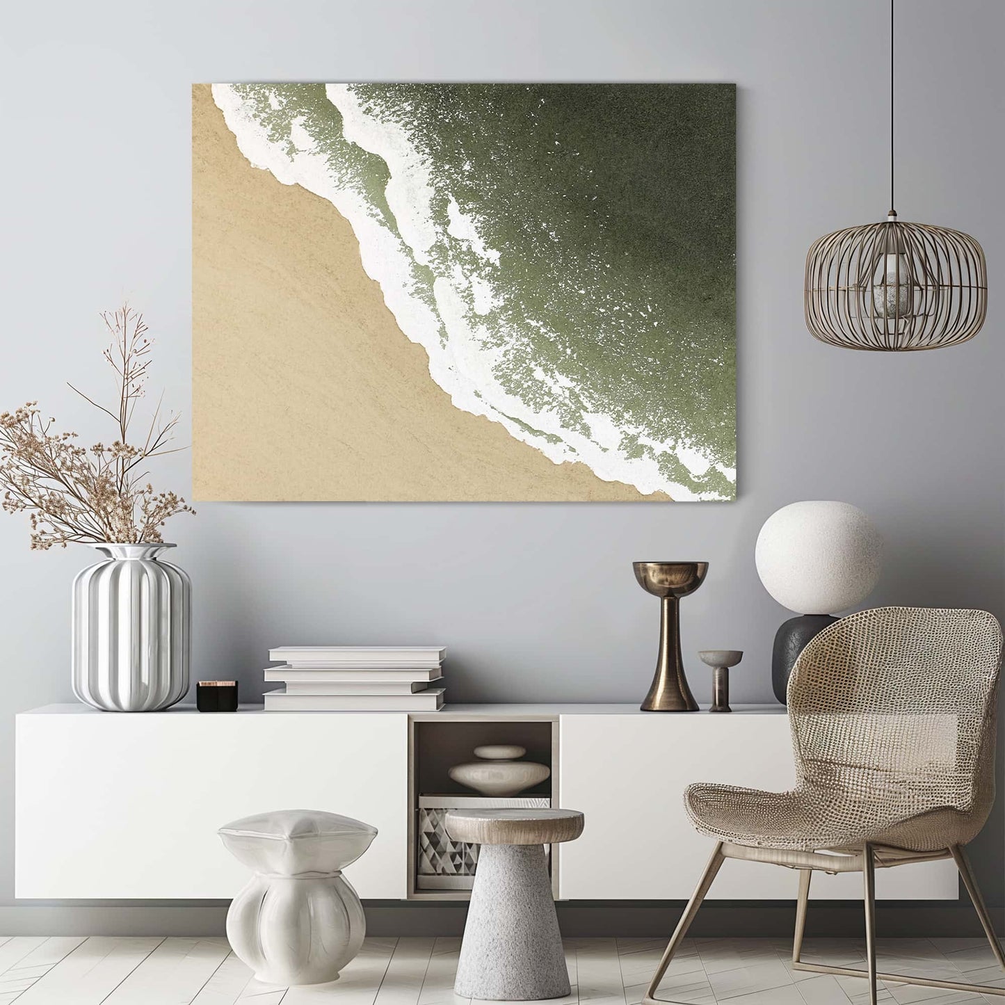 "SEASIDE, STYLE B: Hand-painted Landscape shaped textured wall art painting depicting a cream-coloured beach, white waves crashing on the cream shore, and the green sea, in shades of white, green, sand, and cream, hanging on the wall in the living room."